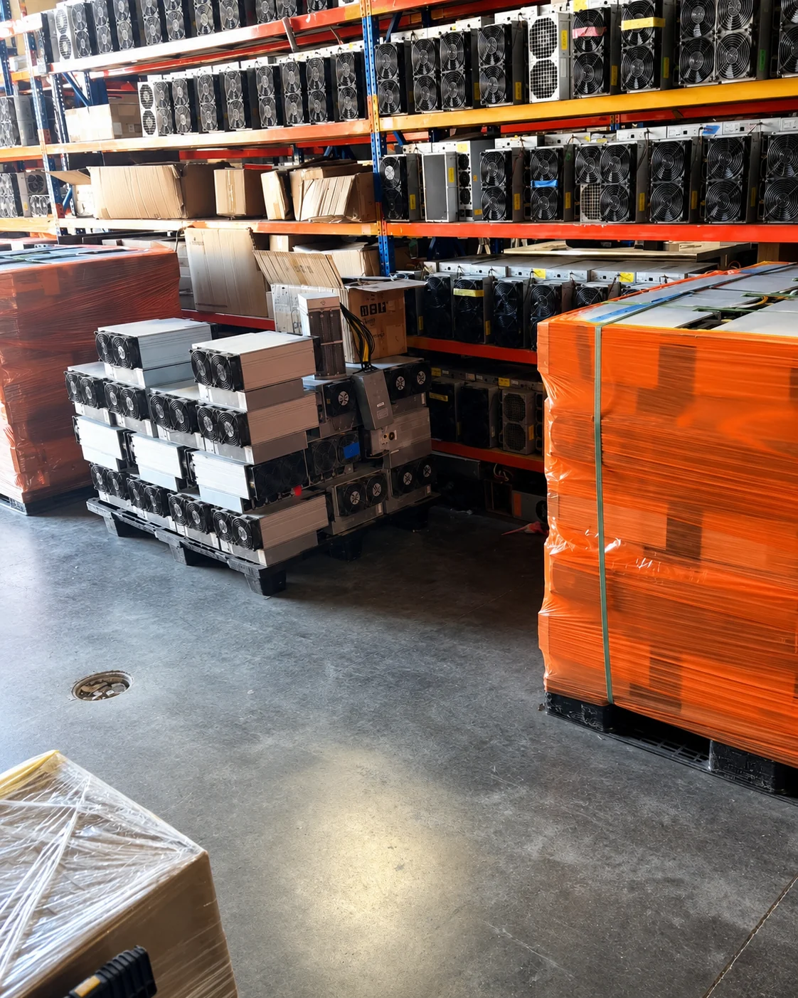 Rows of ASIC miners staged for mining farm fleet repair